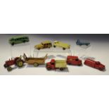 A small collection of Dinky Toys and Supertoys vehicles, including a No. 504 Foden 14-ton tanker,