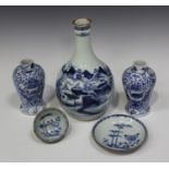 A Chinese Batavian blue and white bamboo and peony pattern tea bowl and saucer, Qianlong period,