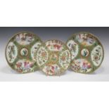 A pair of Chinese Canton famille rose porcelain circular dishes, mid to late 19th century, typically