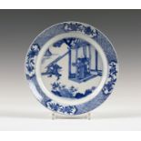 A Chinese blue and white porcelain circular dish, mark and period of Kangxi, the centre painted with