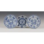 A pair of Chinese blue and white porcelain plates, Kangxi period, each painted with a central