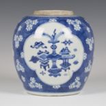 A Chinese blue and white porcelain ginger jar, Kangxi period, of stout ovoid form, painted with