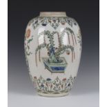 A Chinese famille verte porcelain vase, Kangxi style but probably 19th century, the ovoid body