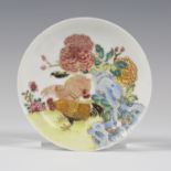 A Chinese famille rose export porcelain circular saucer, Yongzheng period, painted with two