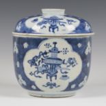 A Chinese blue and white porcelain circular bowl and cover, Kangxi period, each piece painted with