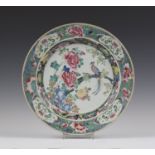 A large Chinese famille rose porcelain circular dish, Yongzheng period, the centre painted with a