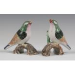 A pair of rare Chinese famille rose enamelled export porcelain figures of finches, Qianlong