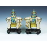 A pair of Chinese cloisonné enamelled figures of elephants, probably Jiaqing period, each