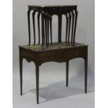 An Edwardian mahogany writing table, fitted with two frieze drawers, on square tapering legs, height