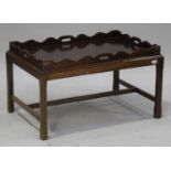 A late 20th century mahogany campaign style butler's tray with pierced handles and brass recessed