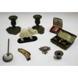 A small group of collectors' items, including a pair of Rococo Revival gilt metal candlesticks, a