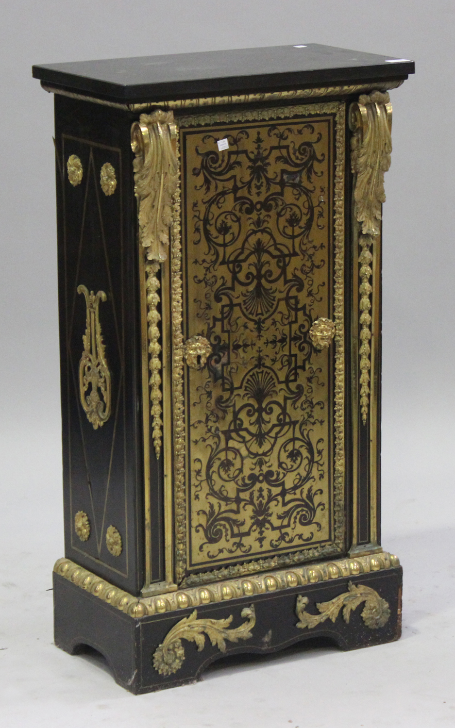 A 19th century French ebonized and ormolu mounted boulle work side cabinet, the black marble top