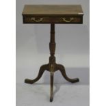 A 19th century walnut wine table, fitted with a drawer, on a turned column and tripod cabriole legs,