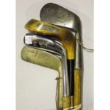 A group of four golf clubs, comprising a James A. Smith brass headed putter, an Anderson