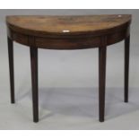 A George III mahogany demi-lune fold-over tea table, on square tapering legs, height 71cm, width