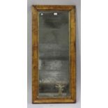 A 19th century bird's eye maple framed rectangular wall mirror with a giltwood slip, 131cm x 59cm.