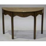 A 19th century mahogany demi-lune side table, raised on block legs, height 74cm, width 111cm.Buyer’s