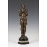 H. Cozzo - a mid-20th century brown patinated cast bronze football trophy, modelled in the form of a