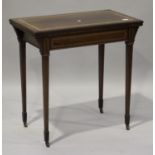 An Edwardian mahogany rectangular fold-over card table with satinwood crossbanded borders, raised on