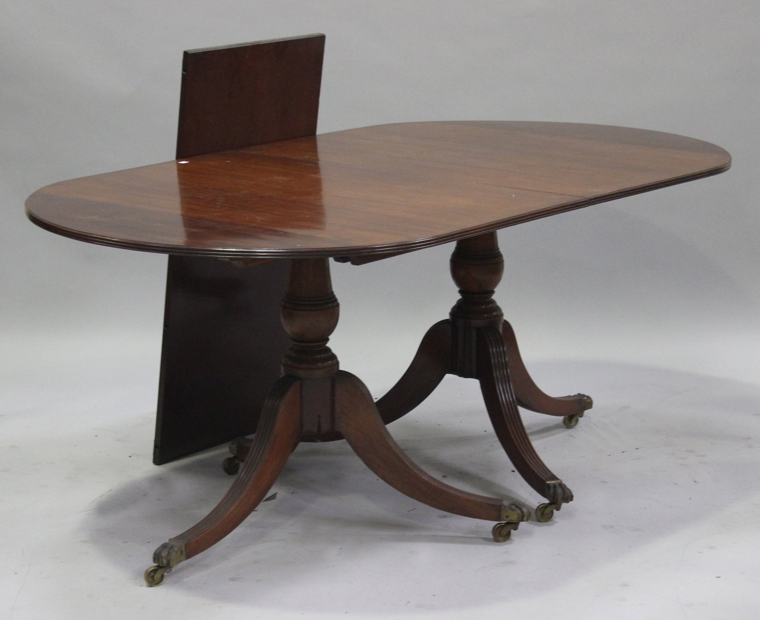 A set of eight George IV mahogany bar back dining chairs with padded seats, raised on square - Image 2 of 2