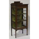 An Edwardian mahogany display cabinet with boxwood stringing, fitted with a single astragal glazed