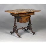 A mid-Victorian Tunbridge ware walnut fold-over games/work table, the top decorated with a view of a