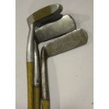 An A.H. Scott, Elie, 'Straight-line' golf putter, length 92cm, an Otey Corisman' U.S.A. Stylist