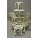 A 20th century white painted cast aluminium garden suite, comprising a table, diameter 70cm, a set