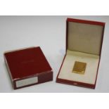 A Dupont Paris gold plated rectangular gas lighter with banded decoration, height 4.7cm, with Dupont