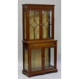 An Edwardian mahogany display cabinet by James Shoolbred & Co with inlaid decoration, the moulded