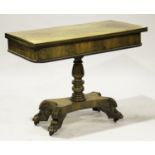 A William IV mahogany rectangular fold-over tea table with beaded decoration, raised on a turned