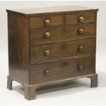 A 19th century mahogany chest of two short and three graduated long drawers, on bracket feet, height