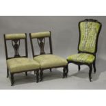 A pair of Edwardian walnut nursing chairs, width 47cm, together with a Victorian walnut framed salon