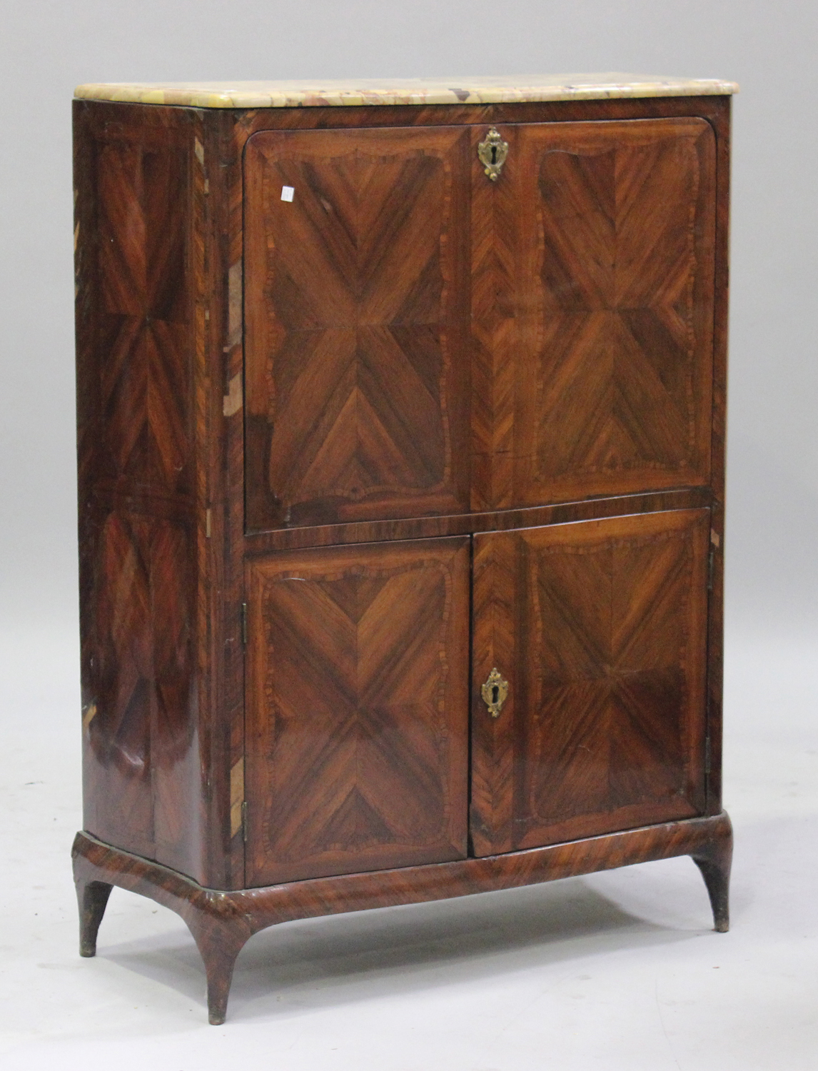 An 18th century French kingwood and rosewood secrétaire à abattant, the marble top above a fall