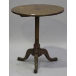 A 19th century oak circular wine table, raised on a turned stem and tripod cabriole legs, height