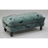 A modern footstool, upholstered in 'Timorous Beasties' fabric, on turned feet, height 49cm, width