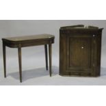 A George III mahogany fold-over card table with boxwood stringing, height 74cm, width 91cm, depth