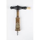 A 19th century bronze barrel corkscrew by Edwin Cotterill, the ebony handle fitted with dusting