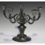 An early 20th century Danish pewter five light candelabrum by Just Andersen, the scrolling