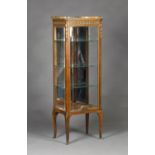 An early 20th century French Transitional style kingwood vitrine of small proportions, the marble