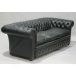 A 20th century buttoned bottle green leather Chesterfield settee, on bun feet and castors, height