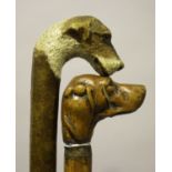 A late 19th century walking stick, the carved boxwood handle finely modelled as a dog's head with