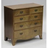 A 20th century George III style mahogany chest of two short and three long drawers with