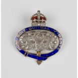 A diamond and enamelled military brooch badge, designed as the badge of the Grenadier Guards pre-