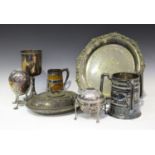 A collection of plated items, including a late Victorian circular salver with cast foliate rim, an