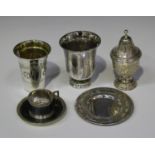 A late 18th century French silver beaker, the bell shaped body engraved with scallop shell and