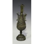 A 19th century Continental white metal filigree bottle and stopper with inner cylindrical liner, the