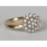 A 9ct gold and diamond cluster ring, mounted with circular cut diamonds, ring size approx O.Buyer’