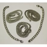 Three silver faceted curblink neckchains, each with a sprung hook shaped clasp, lengths 50.5cm, 49cm