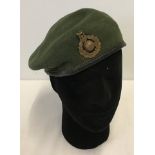 Royal Marines green beret with King's Crown cap badge.